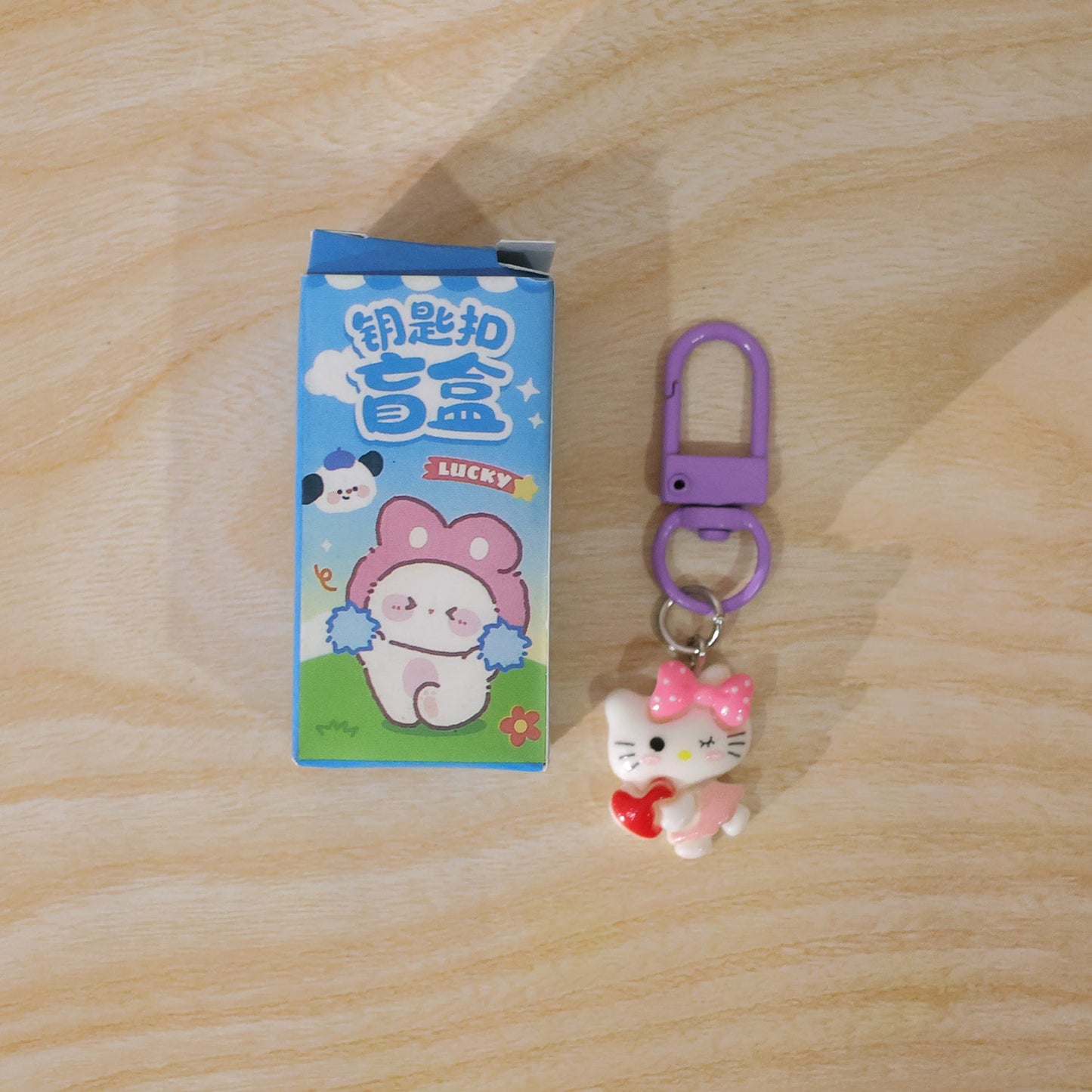 Cartoon keychain with heart and bow (1 pc)